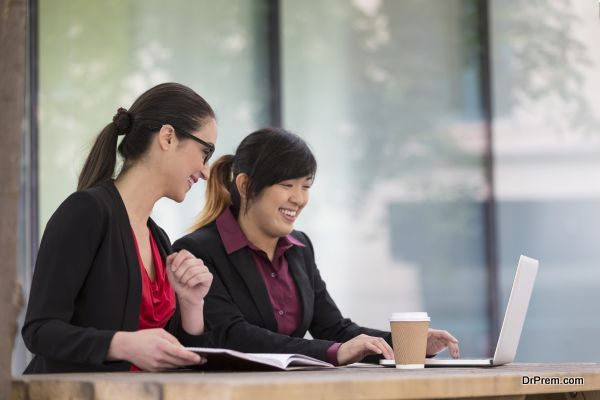 Two Businesswomen working together.