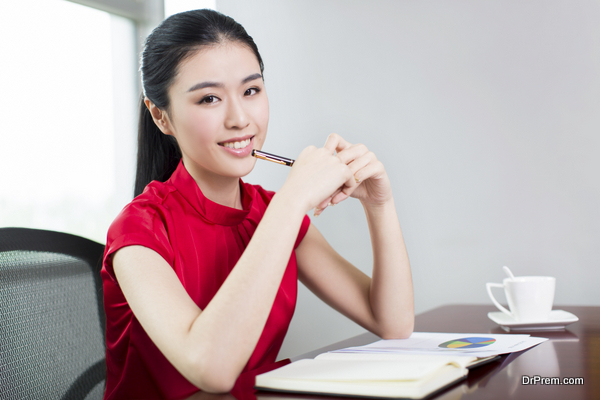 young businesswoman in her office, asia girl.