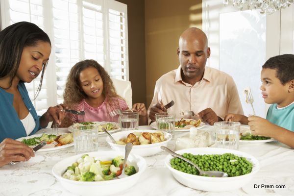 Family Enjoying Meal At Home