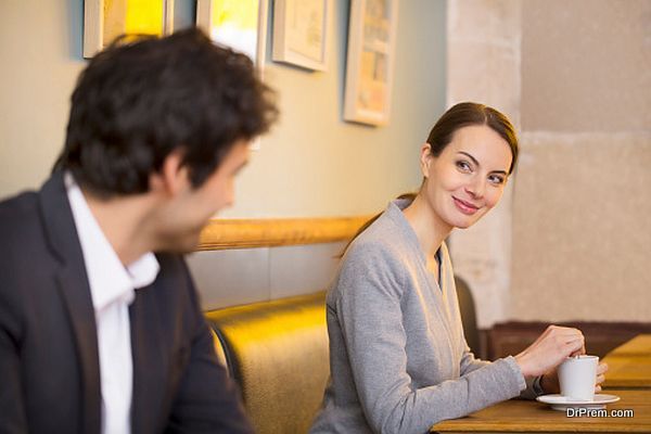 Couple Flirting Together In Bar