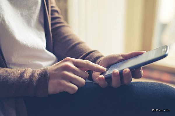 close up of hand woman typing on smart phone