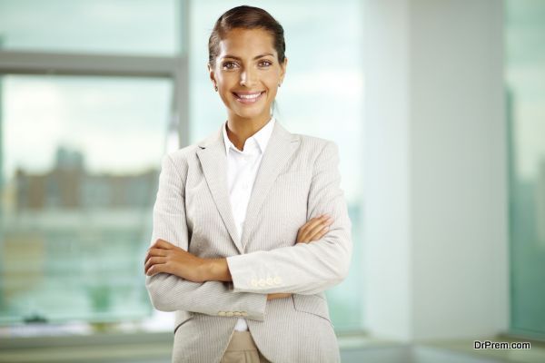 Portrait of successful businesswoman looking at camera with smile