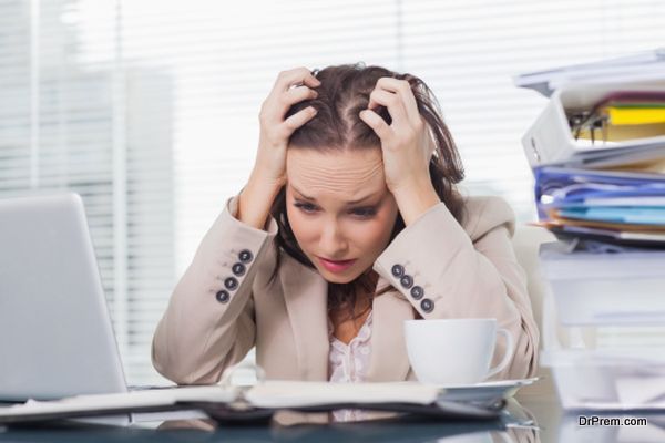 Nervous businesswoman pulling her hair out