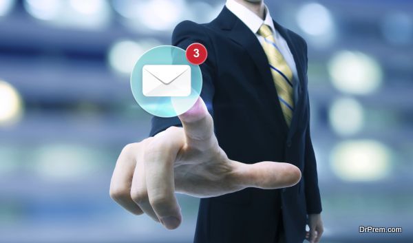 Businessman pointing at an email icon