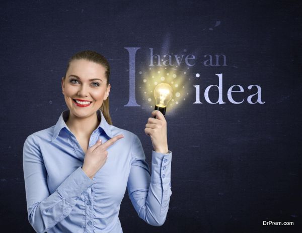 Woman holding bright bulb, concept - I have an idea