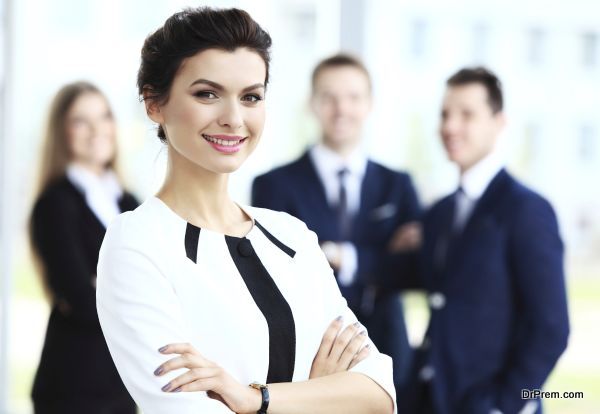 Face of beautiful woman on the background of business people