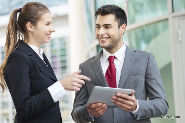 Business people using a digital tablet