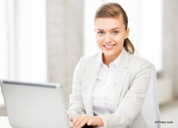 businesswoman with laptop in office