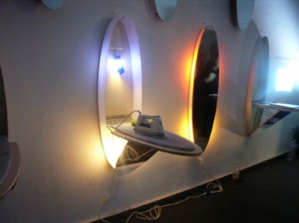 Mirror ironing board closet