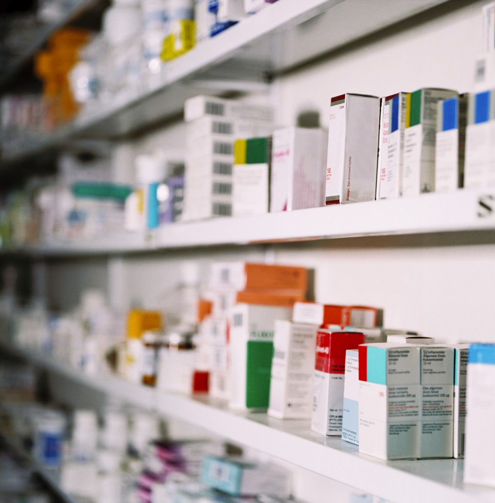 side view of rows of medicines on a shelf