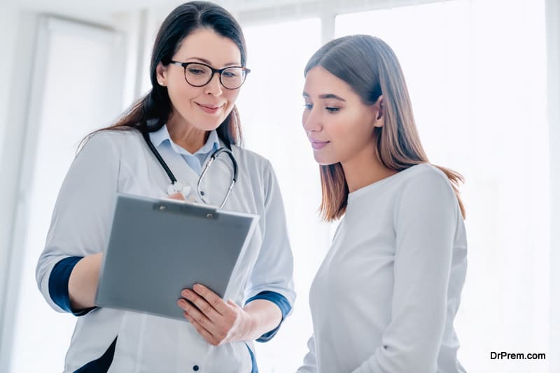woman consulting doctor