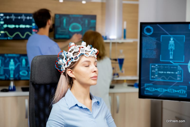 Female patient scanning her brain with neurology headset. Brain monitoring