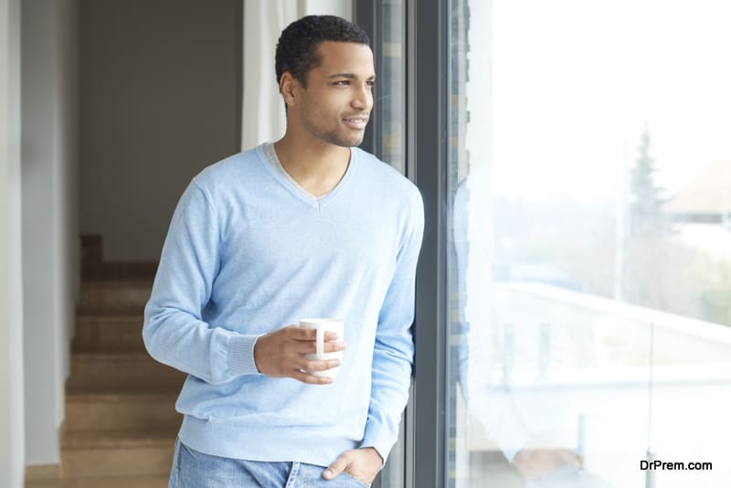 young man enjoying cup of coffee