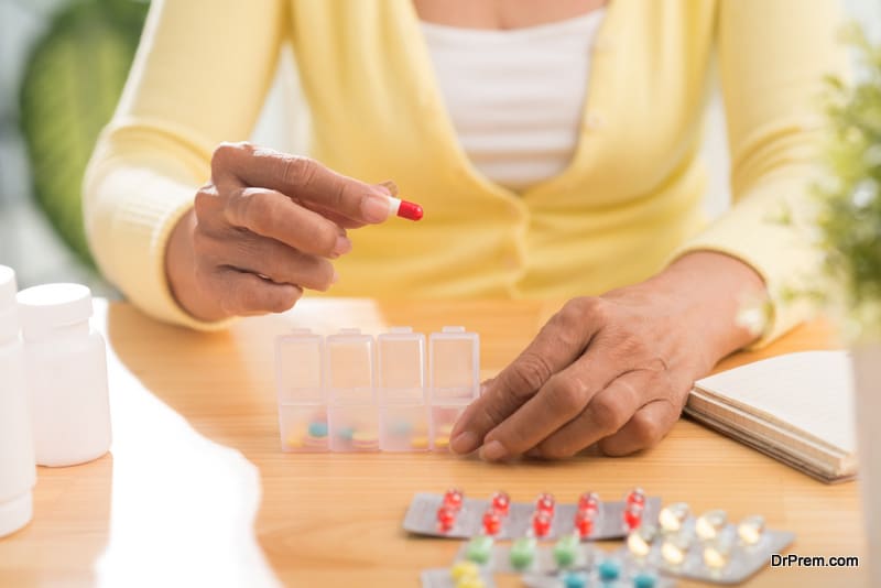  woman taking medication