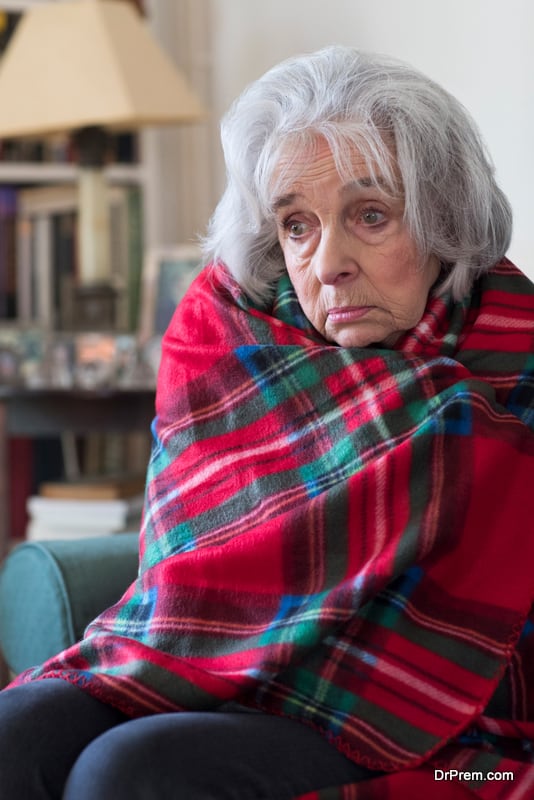 Senior Woman Wrapped In Blanket 