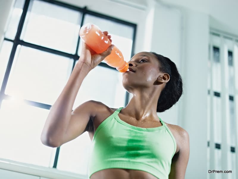 woman Hydrating herself Using Sports Drink