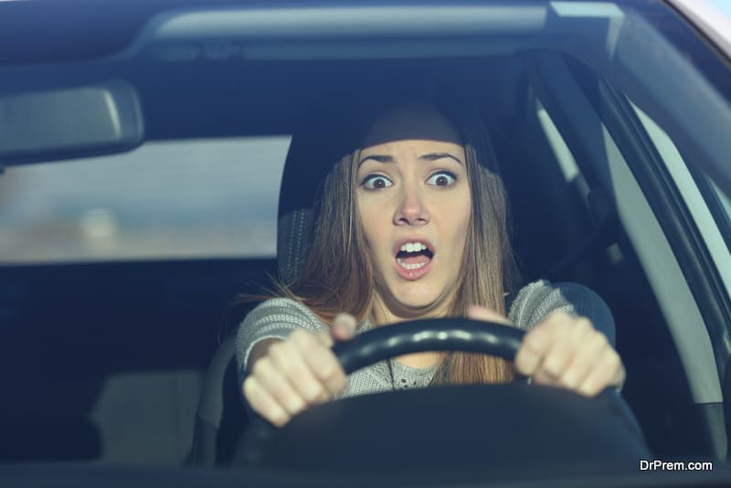 Scared driver driving a car before an accident