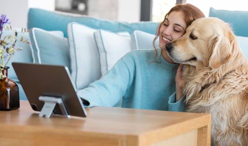 woman with her pet dog