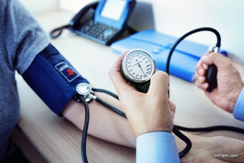  physician-checking-the-blood-pressure-of-a-patient