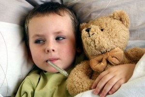flu_symptoms_child_with_bear