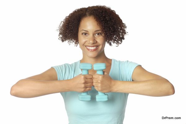 Woman with free weights