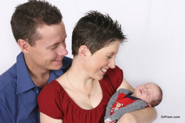 Couple with new born baby