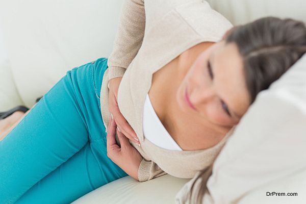 Ill women lying on the sofa