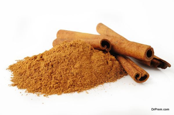 cinnamon powder on white background