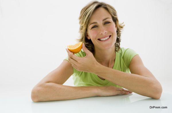 Woman with orange slice