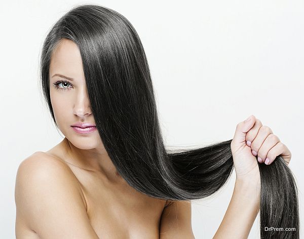 closeup portrait of a beautiful young woman with elegant long shiny hair. hairstyle. isolated on white background.