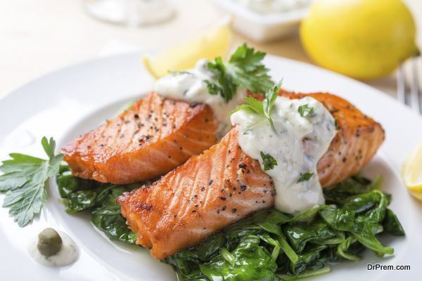 Grilled Salmon with Spinach, Tartare Cream and Lemon Wedges