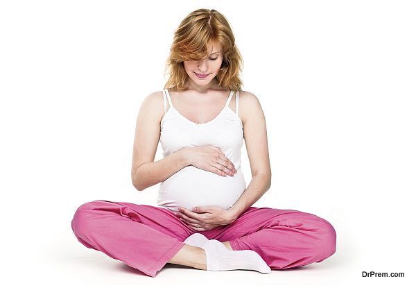 Close-up of a pregnant woman's sitting