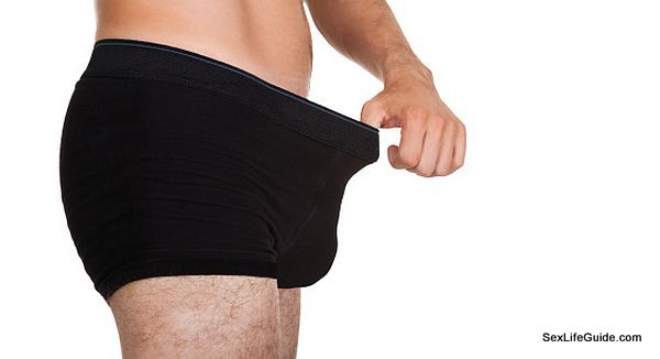 Man looking in his underwear