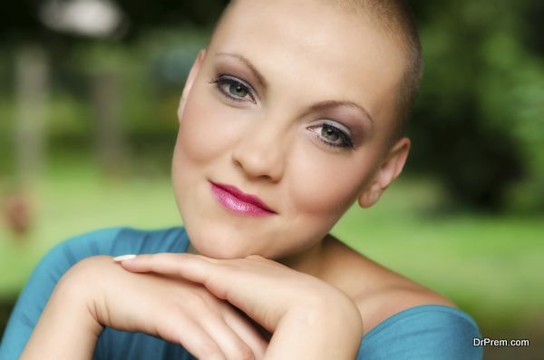 Happy and young cancer survivor after successful chemotherapy