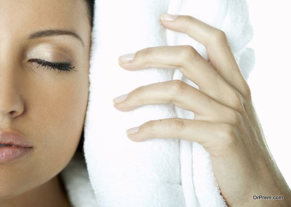 Portrait of Beautiful brunette woman doing daily morning routines (the make up series)