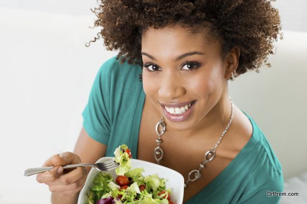 African American Woman Eating Salad