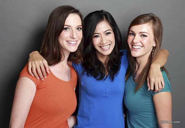 portrait of attractive multi racial three girls best friend together having fun