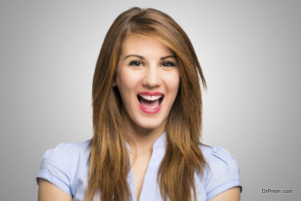 Close-up portrait of an happy woman laughing