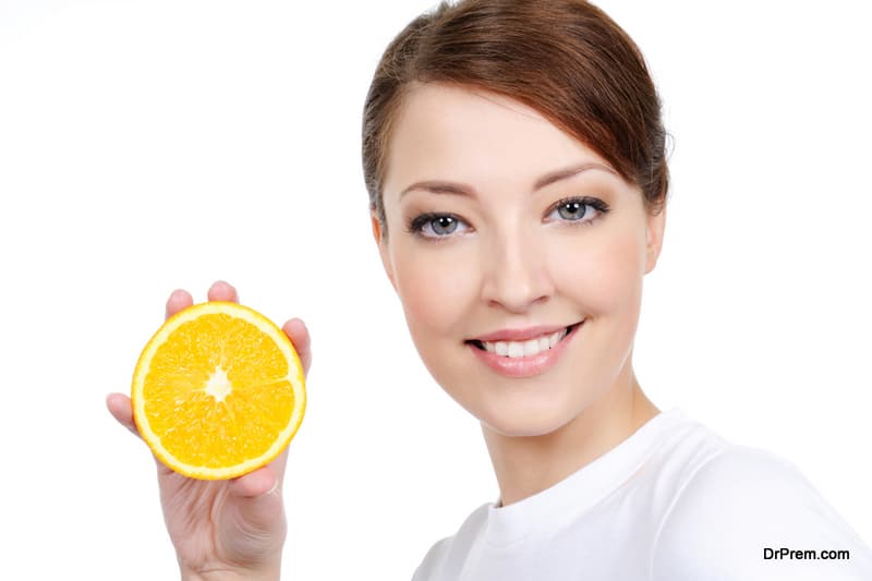 woman-holding-Citrus-fruit