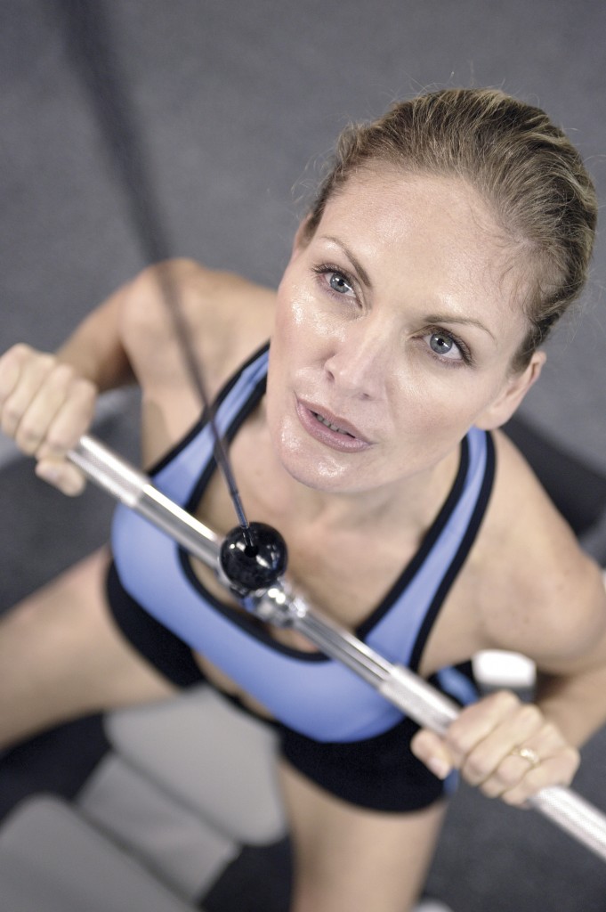 woman Working Out At Gym 