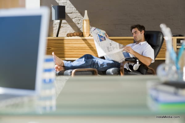 Man reading Newspaper 