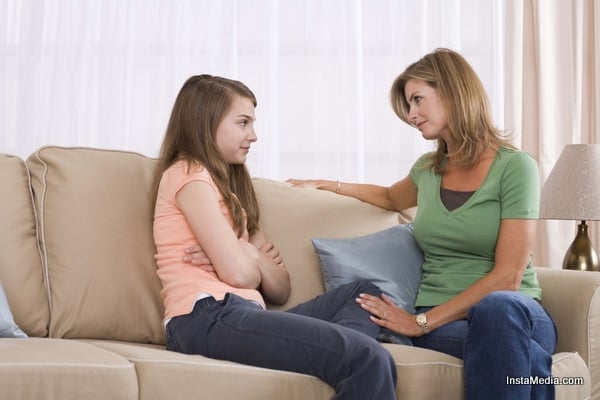 Mother talking to her Daughter 