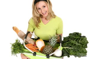 Female with eco shopping bag filled with groceries