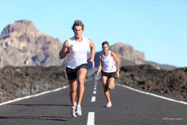 Runners running on road
