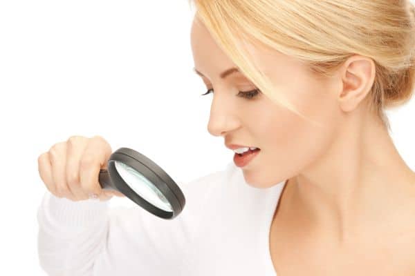 woman with magnifying glass