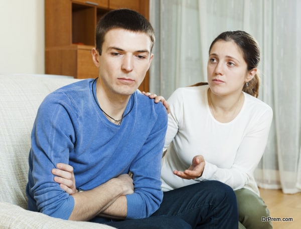 Man has problem, wife comforting him