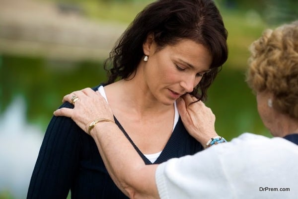 Senior woman consoling her daughter