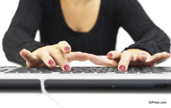 woman typing on keyboard