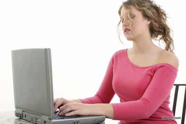 Beautiful Teen Girl Working On Laptop