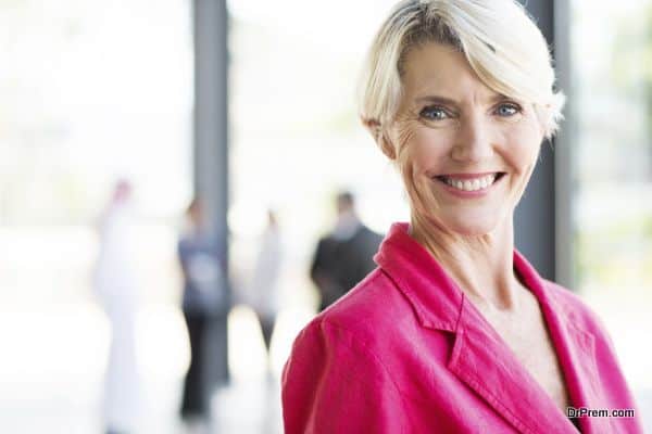 beautiful middle aged businesswoman in modern office